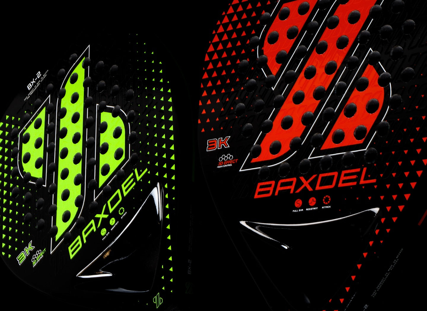 BX-2 en plano superior destacando el relieve 3D del logo; versión color rojo/verde.